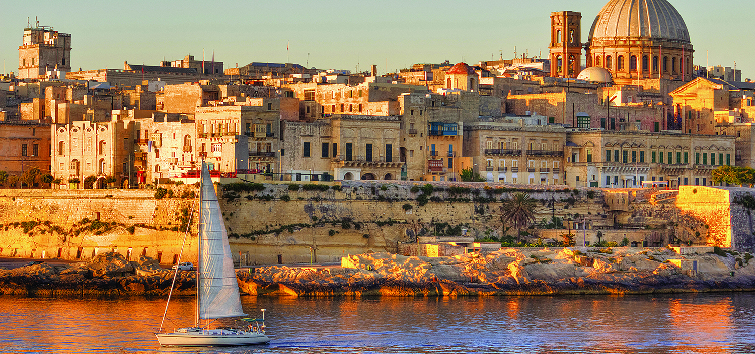 A Malta yacht charter is ideal for cruising next to the city at sundown when golden light covers the island